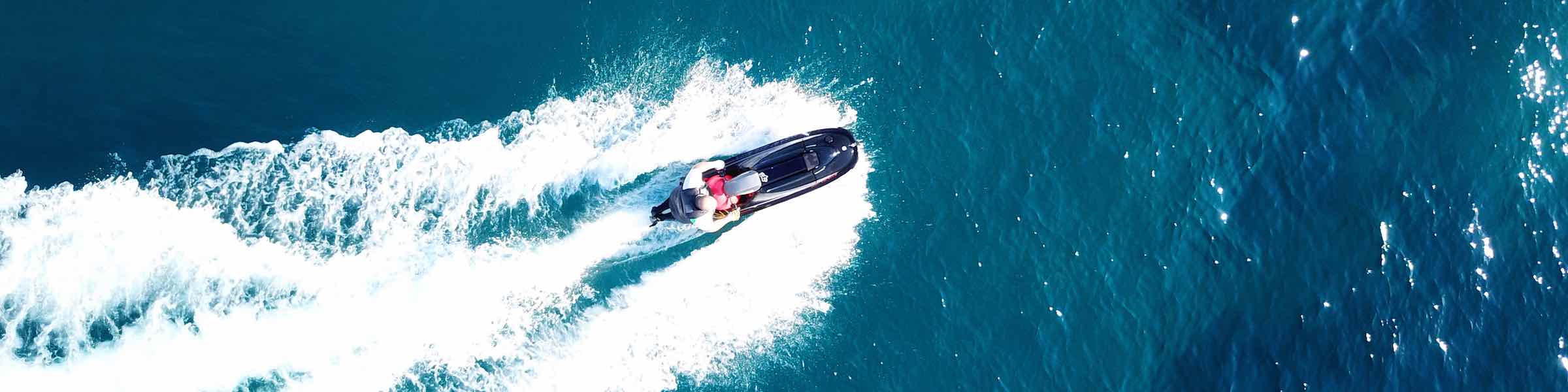 View from above of a person riding a jet ski.