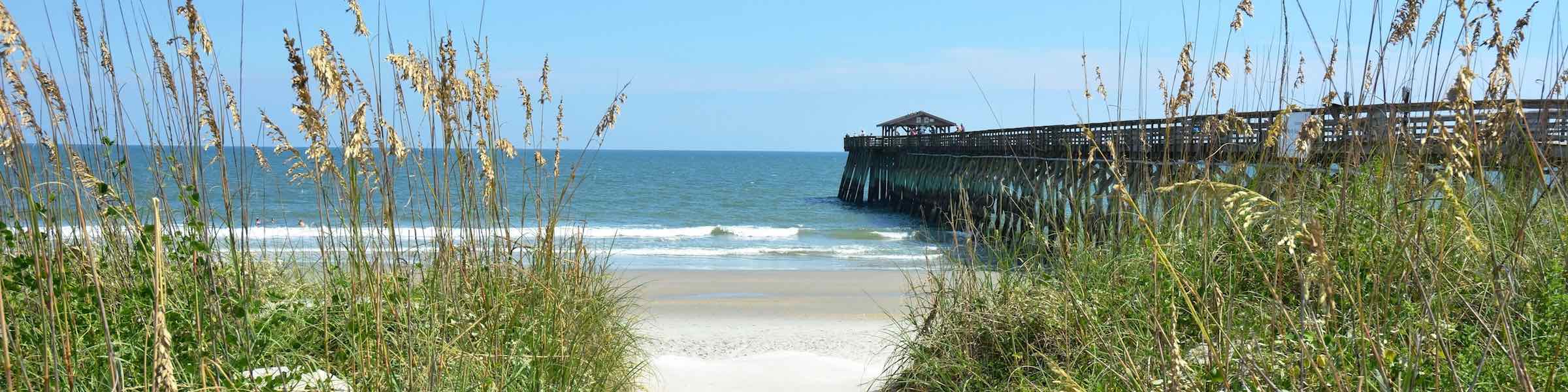 The pier and grasses at Myrtle Beach State Park.